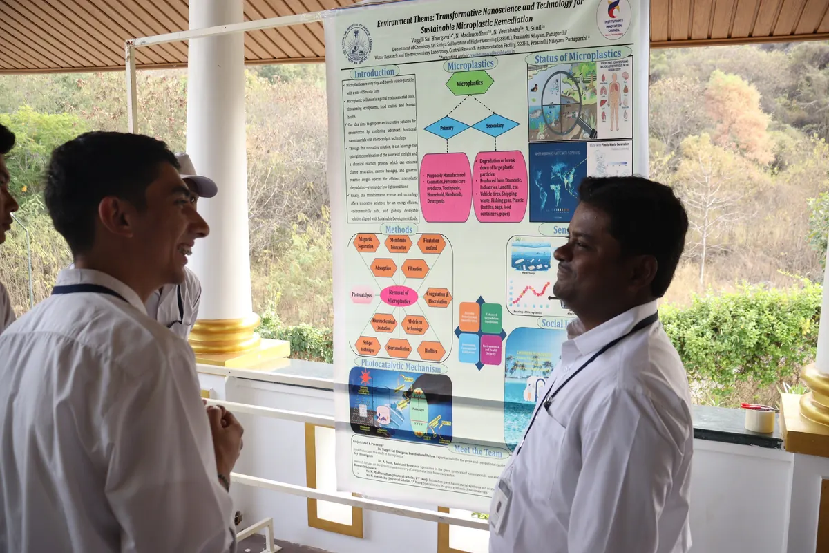 A student presenting a research poster at the Startup Day poster presentation