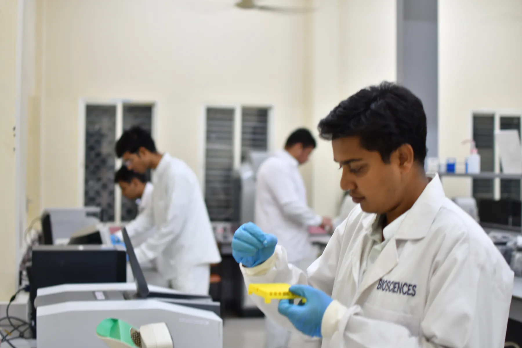 Researchers at work in the Biobank laboratory